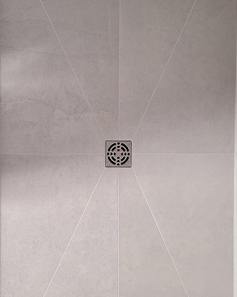 Custom Tile Work For Bathroom Drain Flooring