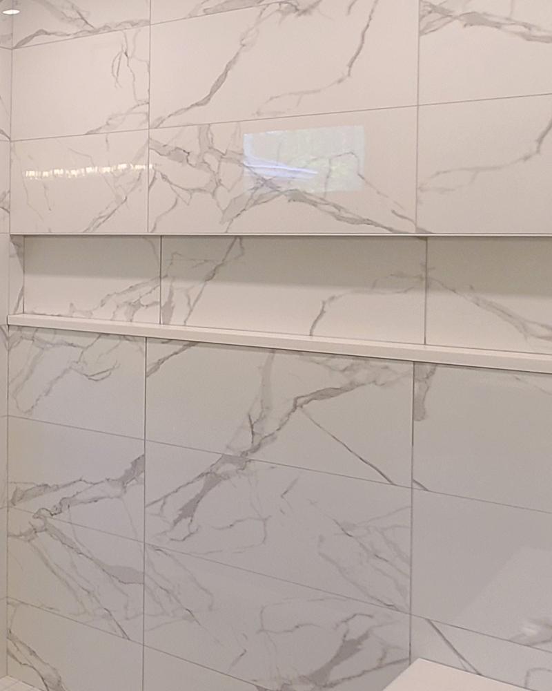 Large Marble Bathroom With Custom Niche