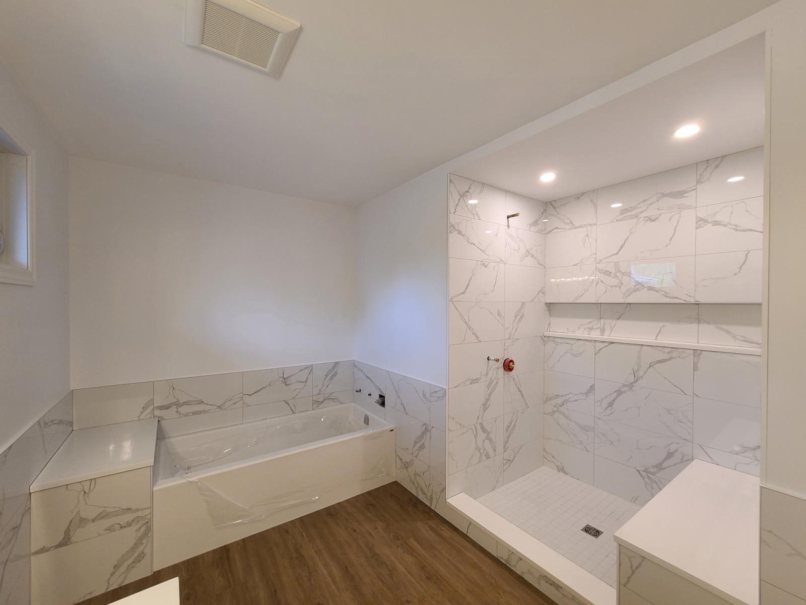 Large Marble Bathroom With Custom Niche